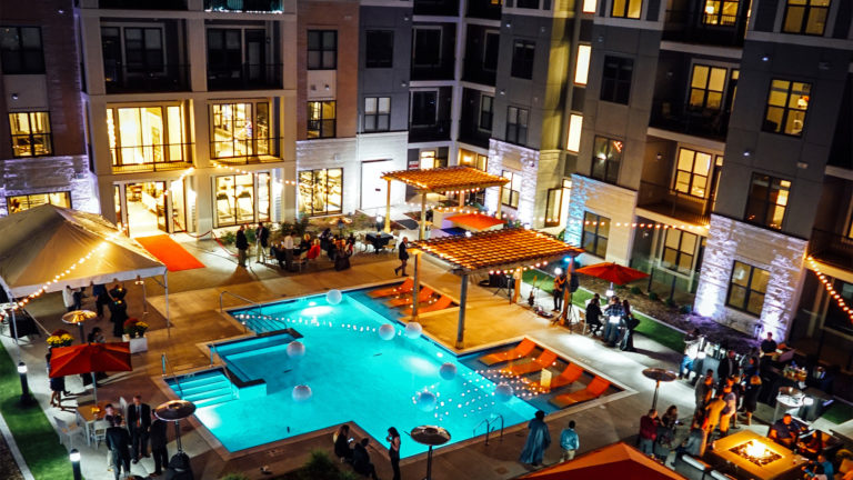 Mayfair Reserve Overview of Pool Courtyard at Night